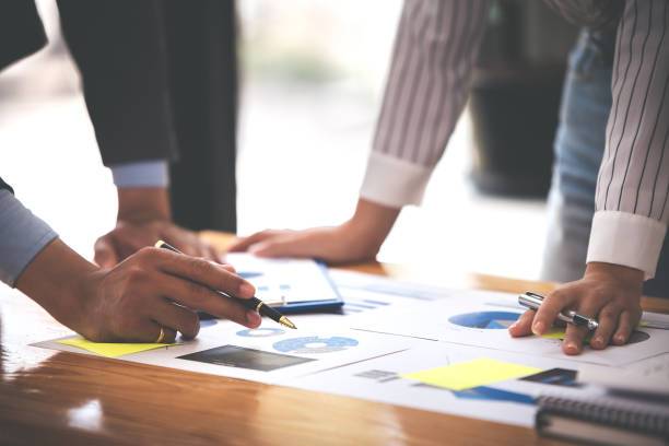 istock Team work with business analytic price chart on the table at the conference room. 1394434001