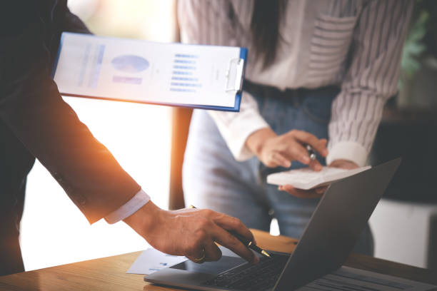 istock Team work with business analytic price chart on the table at the conference room. 1394434022