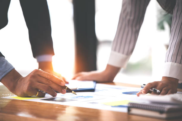 istock Team work with business analytic price chart on the table at the conference room. 1394434053