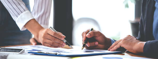istock Team work with business analytic price chart on the table at the conference room. 1394434059
