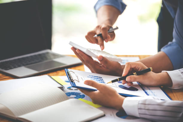 istock Team work with business analytic price chart on the table at the conference room. 1394434075