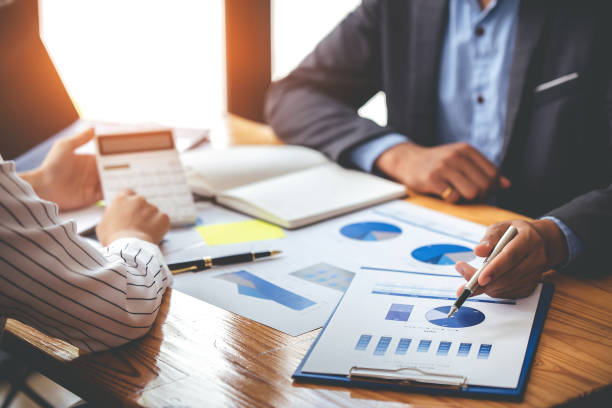 istock Team work with business analytic price chart on the table at the conference room. 1394434109