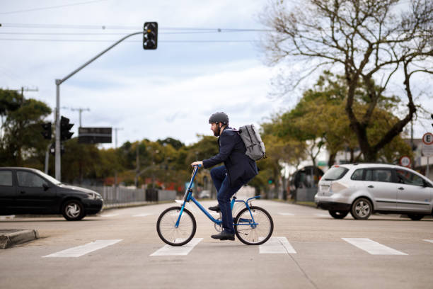 istock Man on a bicycle crossing the crosswalk 1394436454