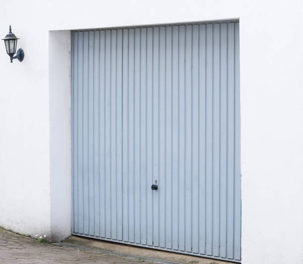 istock Gray metal garage door 1394437630