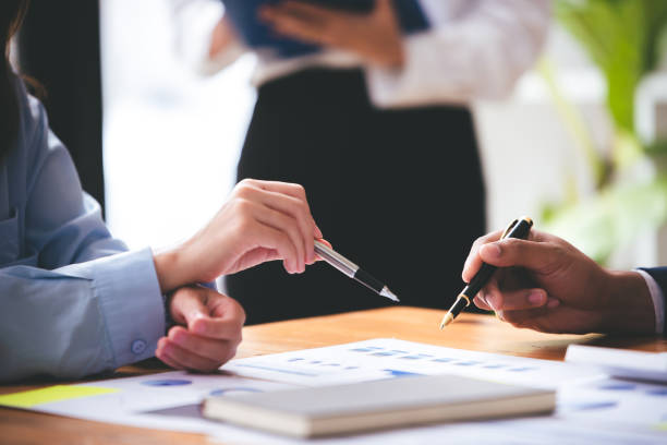 istock Team work with business analytic price chart on the table at the conference room. 1394445387