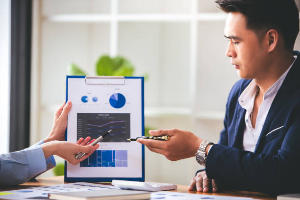 istock Team work with business analytic price chart on the table at the conference room. 1394445408