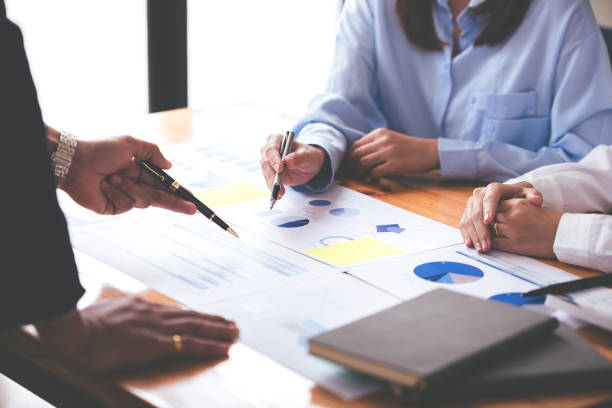 istock Team work with business analytic price chart on the table at the conference room. 1394446595