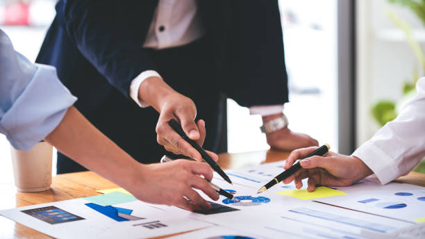 istock Team work with business analytic price chart on the table at the conference room. 1394447796