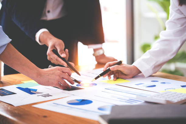 istock Team work with business analytic price chart on the table at the conference room. 1394447802