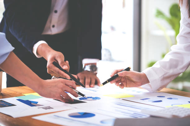 istock Team work with business analytic price chart on the table at the conference room. 1394447812