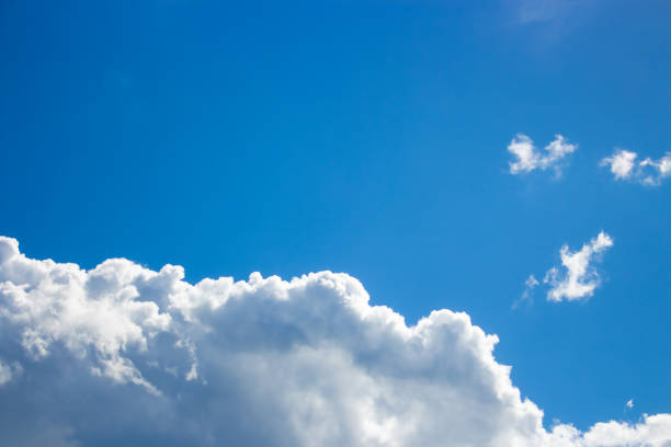 istock Natural background. White clouds against the blue sky 1394449483