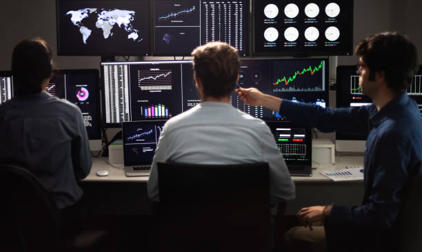 istock Team of financial analysts working in the office. 1394449592
