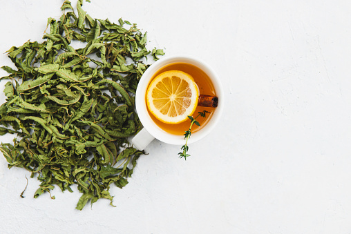 Herbal, green tea on white background. Directly above.