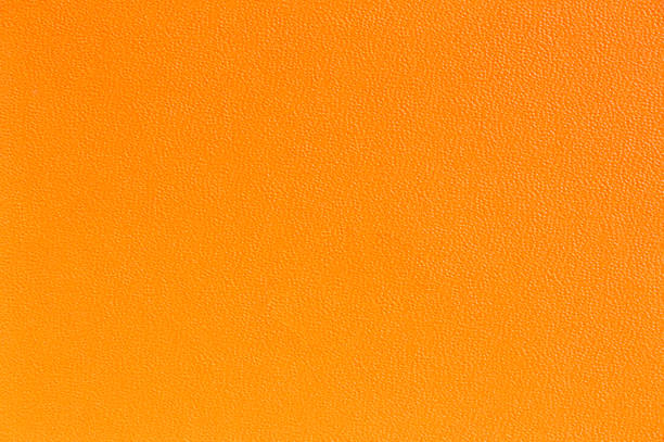 istock Orange background. Orange texture.Surface of orange texture. Vintage background 1394455890