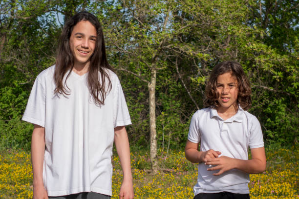 istock Two brothers playing in the garden 1394457168