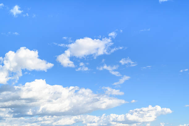 istock Beauty and cloud shapes in blue sky 1394461984