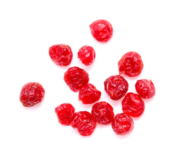 istock Dried cherries isolated on white 1394463173