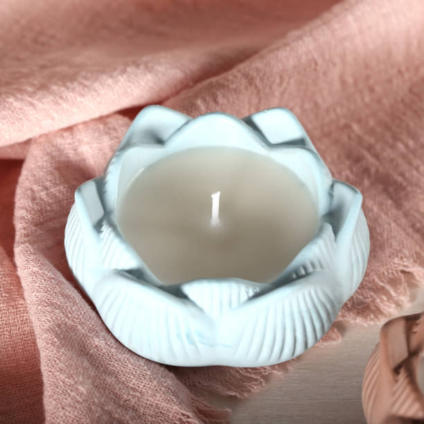 istock A candlestick in the shape of a lotus. 1394463451