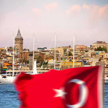 Istanbul cityscape and Turkish flag