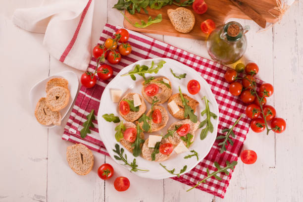 istock Friselle with cherry tomatoes and arugula. 1394464949