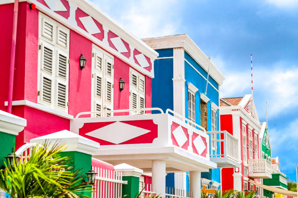 Bold vibrantly painted home exteriors on the tropical and colorful island of Curaçao stock photo