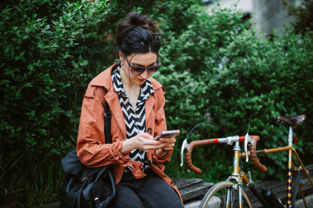 istock commuter stops to check the phone messages 1394470847