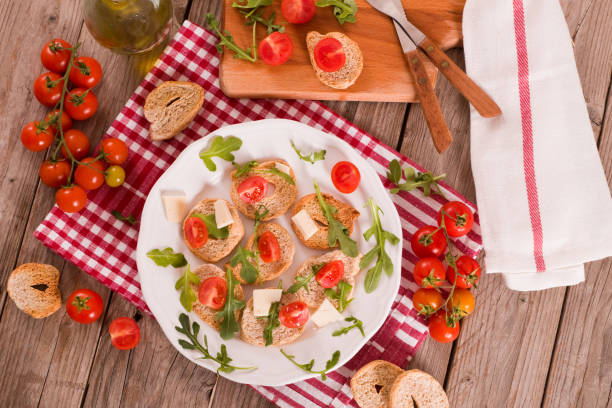 istock Friselle with cherry tomatoes and arugula. 1394470882