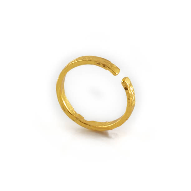 istock Irregular adjustable rotating golden ring isolated on white background 1394471846