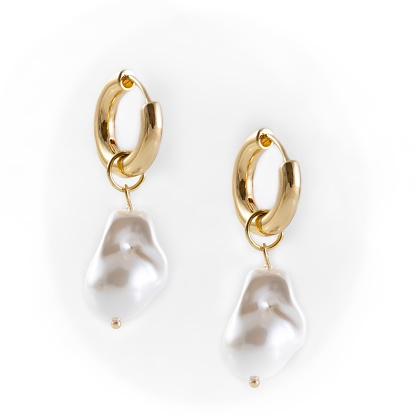 Baroque Pearl Drop Earrings dangling on white background