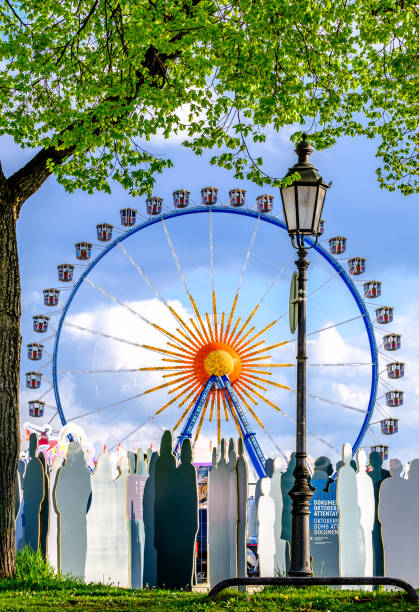 spring festival in munich - germany - amusement park oktoberfest munich chain swing ride imagens e fotografias de stock