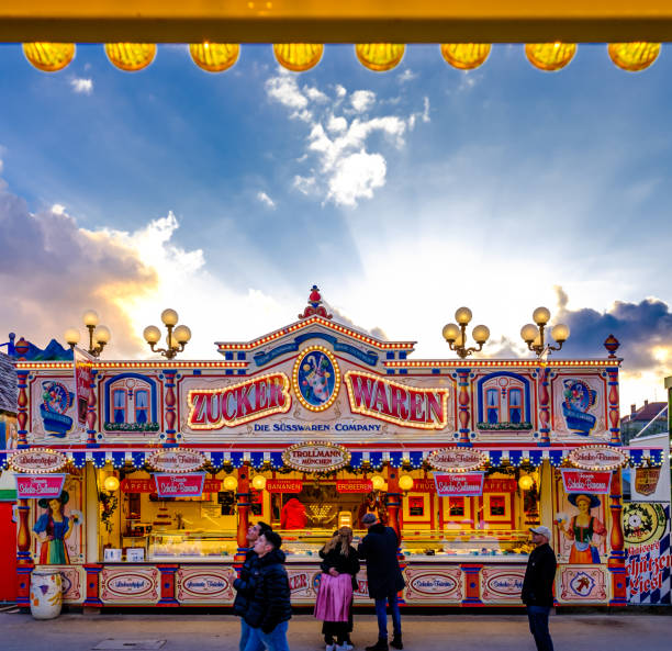 spring festival in munich - germany - amusement park oktoberfest munich chain swing ride imagens e fotografias de stock