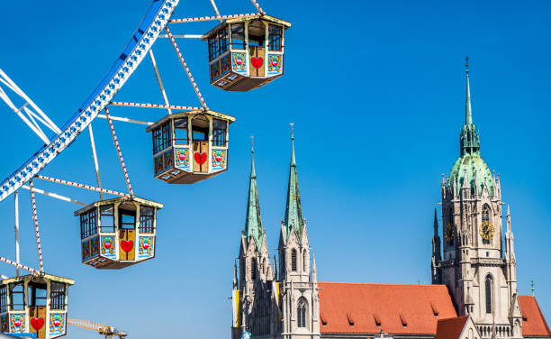 spring festival in munich - germany - amusement park oktoberfest munich chain swing ride imagens e fotografias de stock