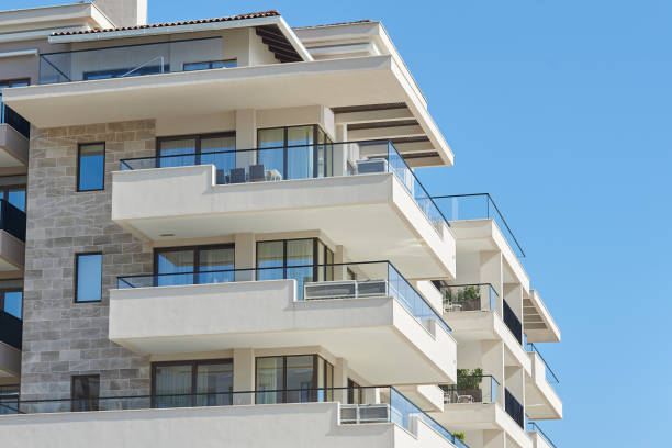 istock Balcony with glass railing in a modern apartment building 1394476526