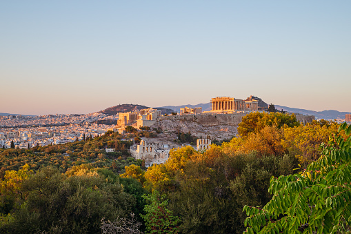 View of Acropolis at sunrise from Plaka rooftop, Athens, Greece