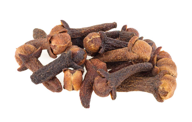 istock clove seeds dry isolated on white background. macro 1394478458