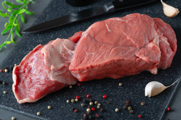 fresh raw beef meat with spices - scotch steak imagens e fotografias de stock