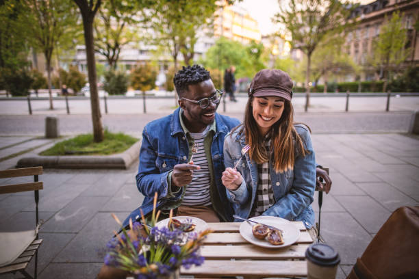 istock Couple on date at outside coffee shop 1394484997