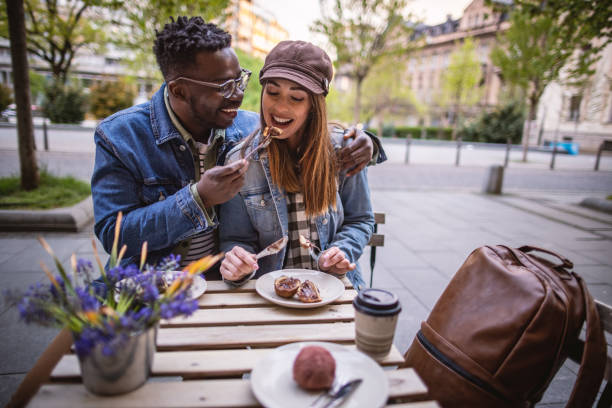 istock Couple on date at outside coffee shop 1394485027