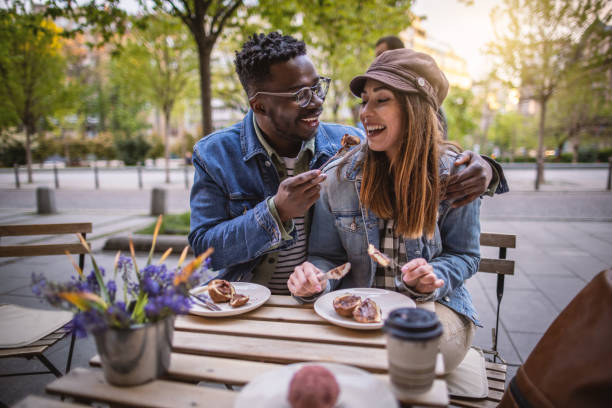 istock Couple on date at outside coffee shop 1394485119