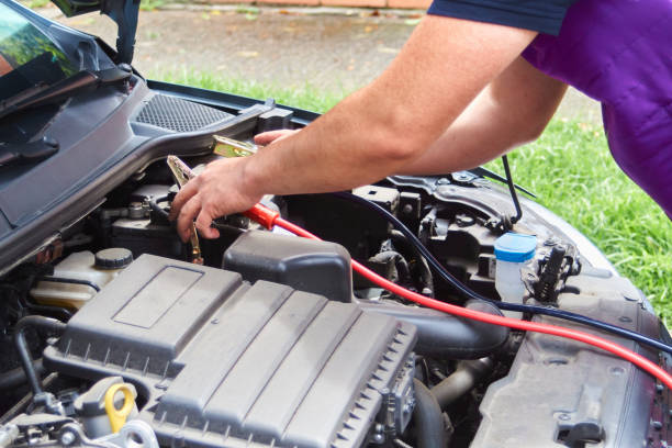 istock man resetting his vehicle's battery 1394492807