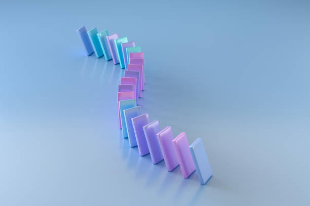 istock Spiral of Multicolored Dominoes on a Blue Table. 3d Rendering 1394492970