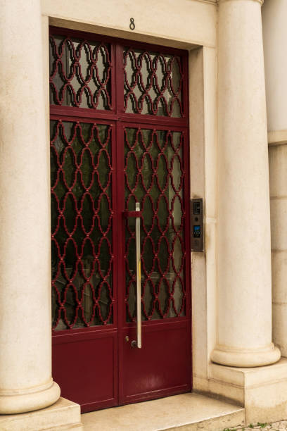 istock Beautiful burgundy front door in Lisbon 1394496672