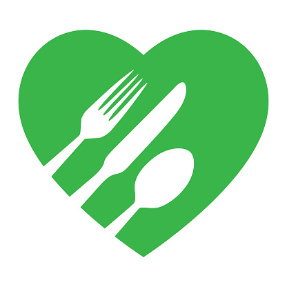 Vector illustration of a green heart with white silverware on it.