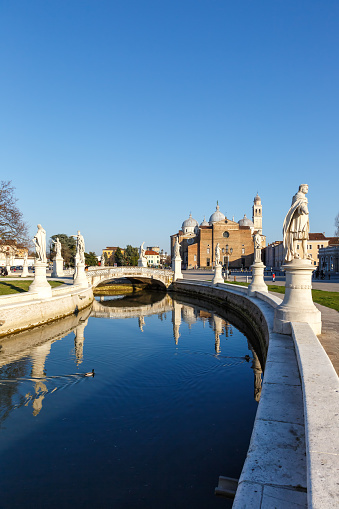 Padua Padova Prato Della Valle square with statues travel traveling holidays vacation town city portrait format in Italy
