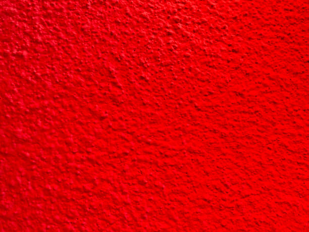 istock Seamless texture of red cement old wall a rough surface, with space for text, for a background.