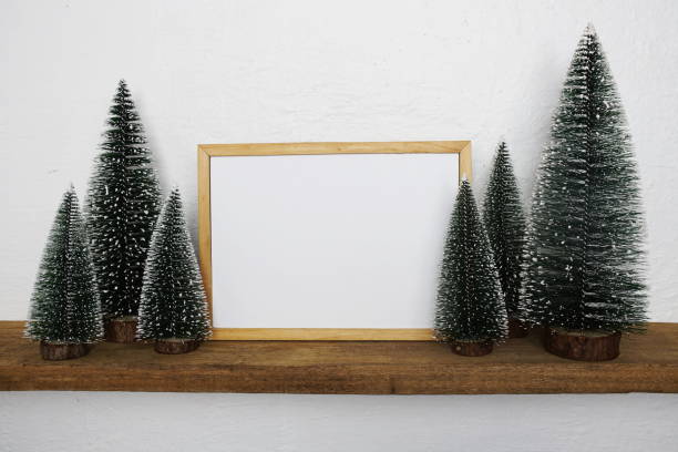 istock Empty mockup with christmas tree on wooden background 1394520500