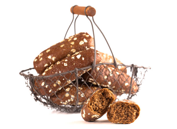 istock Dark Brown Bread with Oats Isolated on a White Background 1394523691
