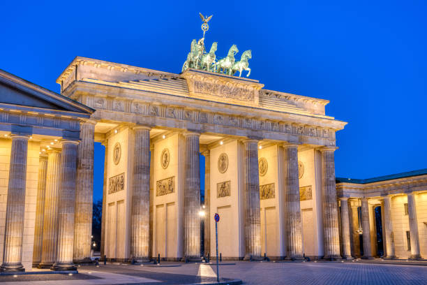 istock The famous illuminated Brandenburg Gate in Berlin 1394527029