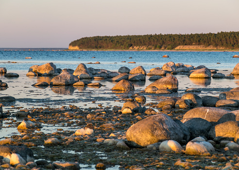 sunset landscape from a traditional rocky beach on the island of Saaremaa, Cape Undva, Tagamoisa Peninsula, Saaremaa Island, Estonia