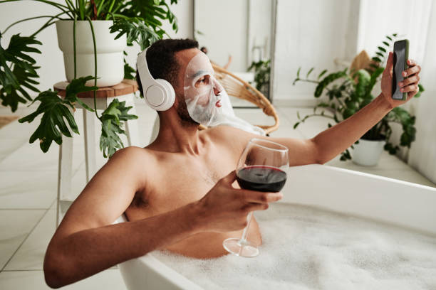istock Man making selfie portrait during spa procedure 1394533393